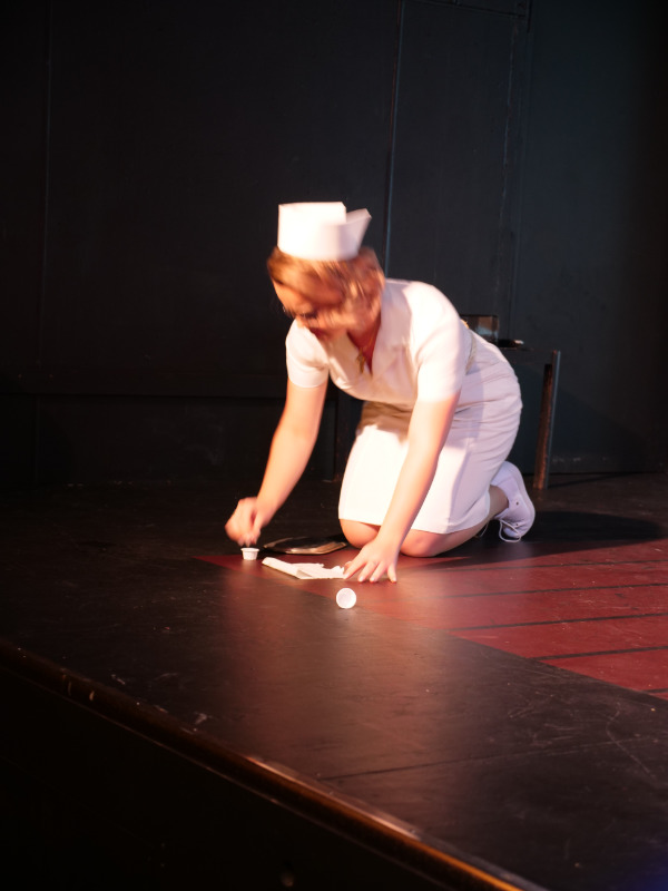 One Flew Over the Cuckoos Nest nurse performing on stage